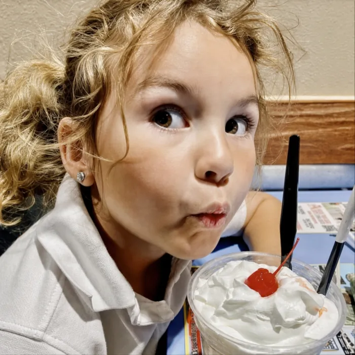 A young guest enjoying a shake